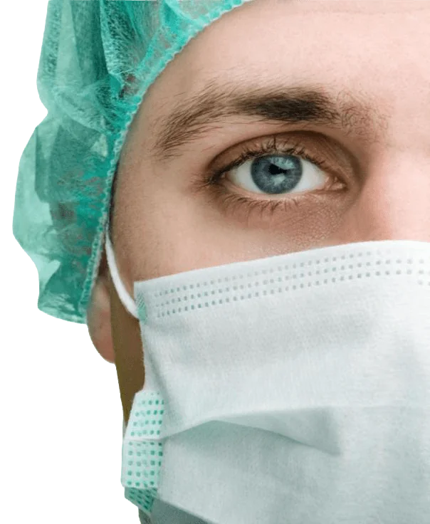 Healthcare professional wearing a surgical mask and cap, emphasizing their commitment to safety and hygiene in a medical environment.